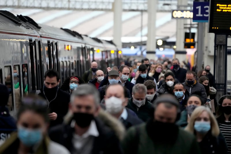 London's Waterloo railway station during the morning rush-hour. People in England have been urged to work from home if possible. AP Photo