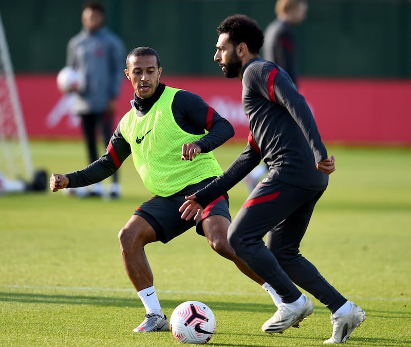 LIVERPOOL, ENGLAND - SEPTEMBER 25: (THE SUN OUT, THE SUN ON SUNDAY OUT) Thiago Alcantara and Mohamed Salah of Liverpool during the training session at Melwood Training Ground on September 25, 2020 in Liverpool, England. (Photo by Andrew Powell/Liverpool FC via Getty Images)