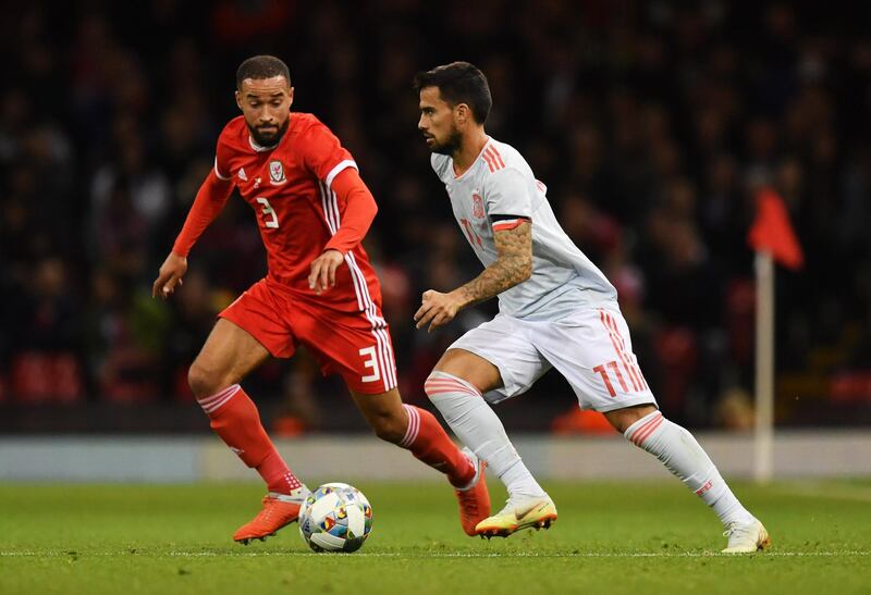 Suso Fernandez of Spain takes on Jazz Richards of Wales during the International Friendly match between Wales and Spain on October 11, 2018 in Cardiff, United Kingdom.  (Photo by Dan Mullan/Getty Images)