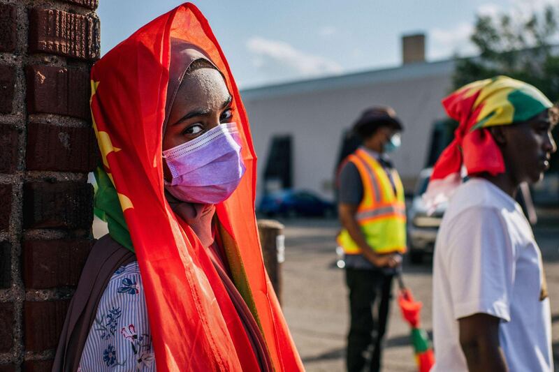 Members of the Oromo community march in protest after the death of musician and revolutionary Hachalu Hundessa on July 8 in St. Paul, Minnesota. AFP