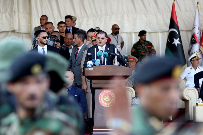 Mr Dbeibah speaks during the military ceremony in the capital.  