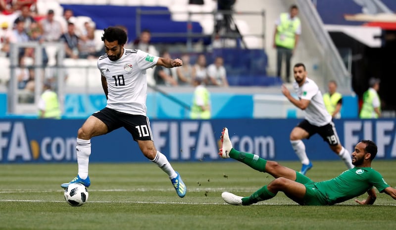 Egypt's Mohamed Salah in action with Saudi Arabia's Abdullah Otayf. Reuters