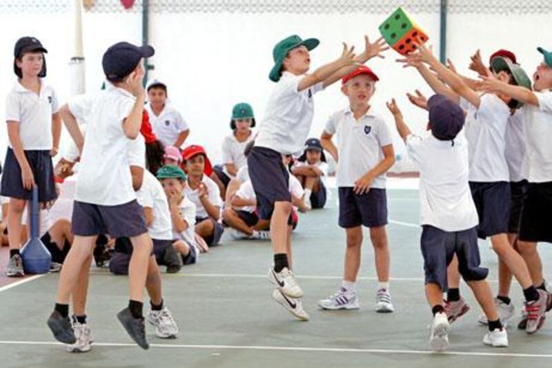 Students play during a PE class in the Willington International school in Dubai.