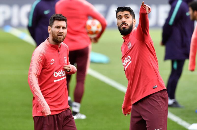 epa07551598 FC Barcelona's Lionel Messi (L) and  Luis Suarez (R) attends a training session at Anfield in Liverpool, Britain, 06 May 2019. FC Barcelona will face Liverpool FC in their UEFA Champions League semi final, second leg soccer match on 07 May 2019.  EPA/PETER POWELL