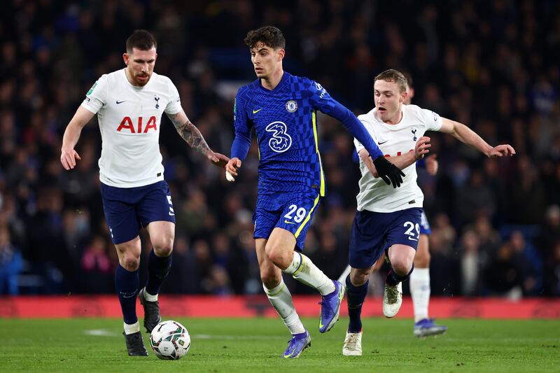 Kai Havertz of Chelsea runs the ball away from Pierre-Emile Hojbjerg and Oliver Skipp of Tottenham Hotspur during their Carabao Cup semi-final at Stamford Bridge on January 5. Getty