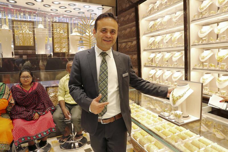 DUBAI , UNITED ARAB EMIRATES , Mar 10 – 2020 :- Suresh Kumar Mulani, Assistant Shop In-charge during the interview at the Kanz jewellery shop in Dubai Gold Souk in Deira Dubai. ( Pawan Singh / The National ) For News/Online Story by Kelly