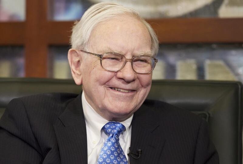 A 28-year-old cryptocurrency pioneer bid the record $4.57m at a charity auction to have lunch with billionaire Warren Buffett. Photo: AP