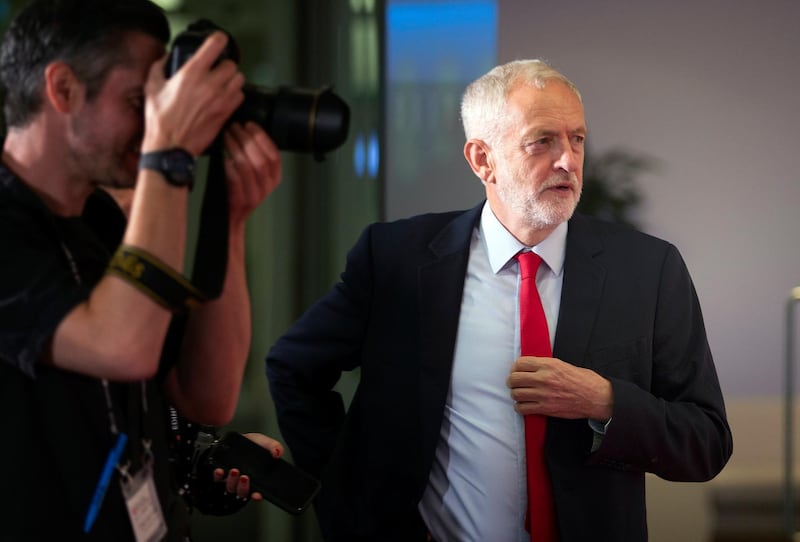 Britain's opposition Labour Party leader Jeremy Corbyn arrives to face the media after delivering the Alternative MacTaggart lecture exploring the role of the media, at the Edinburgh Television Festival in Edinburgh, Scotland, Thursday Aug. 23, 2018. (Jane Barlow/PA via AP)