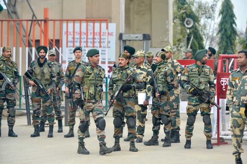 Indian security forces stand guard near the India-Pakistan border in Wagah on March 1, 2019, as they wait for the return of an Indian Air Force pilot being returned by Pakistan. Pakistan was set to free a captured Indian pilot on March 1 in a "peace gesture" aimed at lowering temperatures with its nuclear arch-rival, after rare aerial raids ignited fears of a dangerous conflict in South Asia. AFP