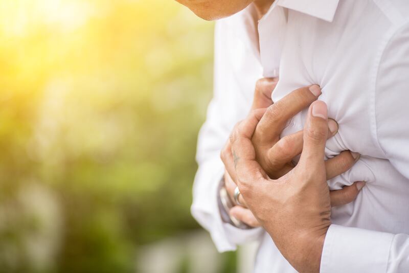 Chest pain can be one of the more acute symptom of long Covid. Getty Images