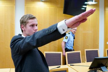 Norwegian suspect Philip Manshaus makes the Nazi salute as he appears in court in Norway. EPA