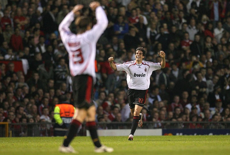 AC Milan's Brazilian midfielder Ricardo Kaka (R) celebrates scoring against Manchester United during their European Champions League semi final first leg football match at Old Trafford, Manchester, north west England, 24 April 2007. AFP PHOTO/FILIPPO MONTEFORTE (Photo by FILIPPO MONTEFORTE / AFP)