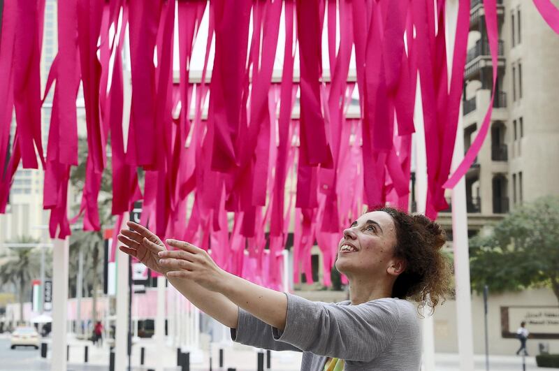 DUBAI , UNITED ARAB EMIRATES , MARCH 1  – 2018 :- Emmanuelle Moureaux , French Artist based in Tokyo with her famous 100 shades of colour art work in Downtown Dubai in Dubai. ( Pawan Singh / The National ) For Arts & Life. Story by Chris