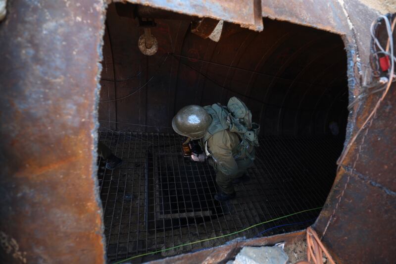 Israeli army spokesman Admiral Daniel Hagari in an entrance of the tunnel. EPA