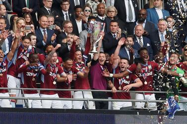 Aston Villa's Jack Grealish and teammates lift trophy as they celebrate winning the play-offs. David Klein / Reuters