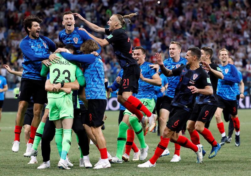 epa06856784 Players of Croatia celebrate after the FIFA World Cup 2018 round of 16 soccer match between Croatia and Denmark in Nizhny Novgorod, Russia, 01 July 2018. Croatia won the match 3-2 after a penalty shootout. 

(RESTRICTIONS APPLY: Editorial Use Only, not used in association with any commercial entity - Images must not be used in any form of alert service or push service of any kind including via mobile alert services, downloads to mobile devices or MMS messaging - Images must appear as still images and must not emulate match action video footage - No alteration is made to, and no text or image is superimposed over, any published image which: (a) intentionally obscures or removes a sponsor identification image; or (b) adds or overlays the commercial identification of any third party which is not officially associated with the FIFA World Cup)  EPA/ETIENNE LAURENT   EDITORIAL USE ONLY  EPA-EFE/ETIENNE LAURENT   EDITORIAL USE ONLY