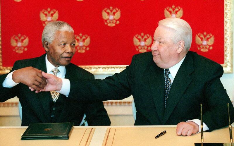 Russian President Boris Yeltsin, right, shakes hands with South African President Nelson Mandela in Moscow. Misha Japaridze / AP Photo