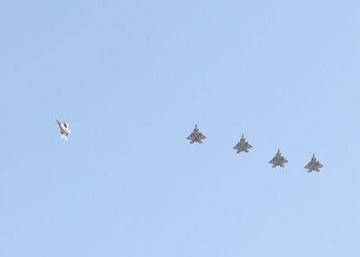 US Air Force F-22 Raptors fly in formation as they prepare to land. US Air Force photo 