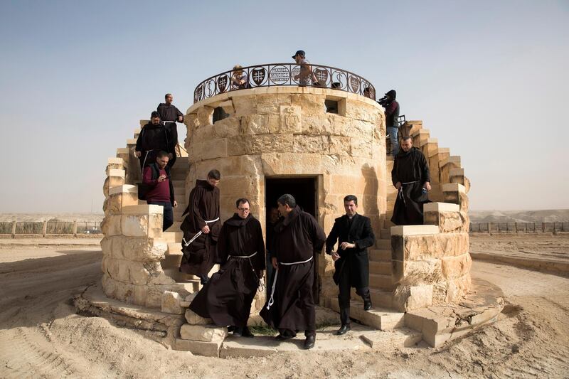 A group of monks pose for a picture as they visit the Franciscan church for the first time at the Qasr al-Yahud baptism site in the Jordan River, West Bank near Jericho. EPA
