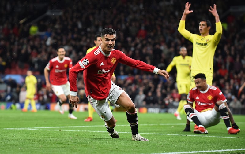 Cristiano Ronaldo celebrates after scoring Manchester United's winning goal in their Champions League match against Villarreal at Old Trafford on Wednesday. Photo: EPA