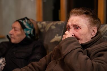 Ludmila Starkova, who fled her home in Kharkiv in the Ukraine with her family following the Russian invasion, wipes a tear from her eye at their new home in Caldecote near Cambridge. The family of ten, who range in age from Alikhan, aged 10, to 90-year-old great grandmother Ludmila, began their journeys on March 1, and have been helped by Rends Platings to find a new home in the UK for them and their two dogs Mikki and Florie. Picture date: Tuesday March 22, 2022.