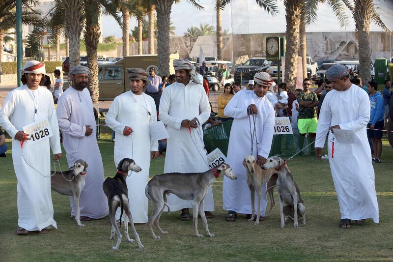 Contestants display their animals during a dog show in Muscat. AFP