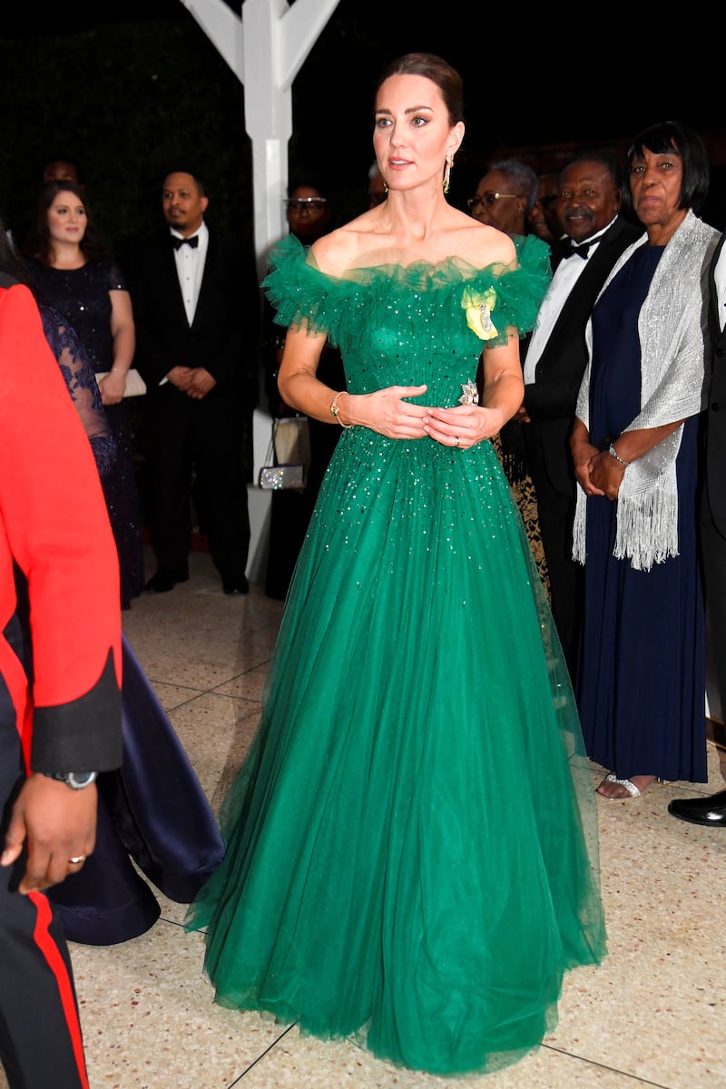Catherine, Duchess of Cambridge wears a green bespoke Jenny Packham gown to attend a dinner hosted by the Governor General of Jamaica Patrick Allen and his wife Patricia in Kingston, Jamaica on March 23. Reuters