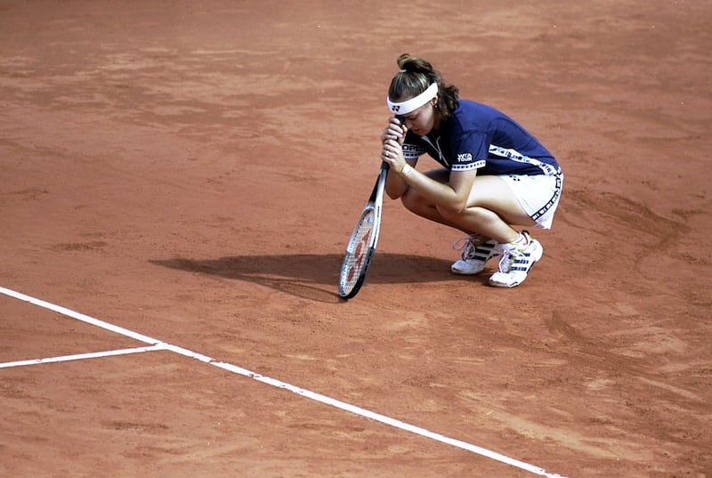 5 Jun 1999:  Martina Hingis of Switzerland is dejected during the 1999 French Open Final match against Steffi Graf of Germany played at Roland Garros in Paris, France.  The match finished with Steffi Graf of Germany clinching the title after dramatic comeback 4-6, 7-5, 6-2. \ Mandatory Credit: Al Bello /Allsport