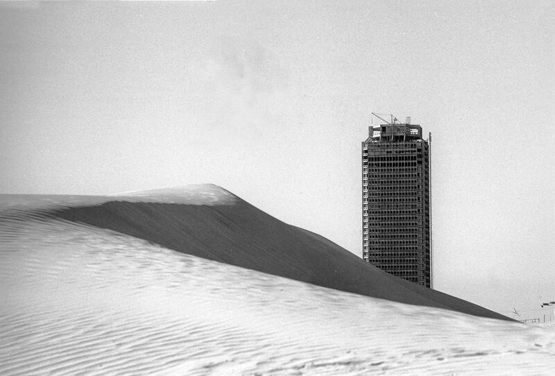 The World Trade Centre, still under construction, as seen behind dunes, late 1970s. Courtesy of Gordon Heald.