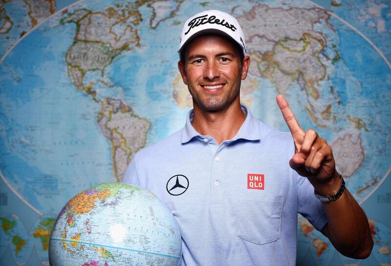 Adam Scott poses with a globe after becoming world No 1 ahead of the Crowne Plaza Invitational at Colonial, starting on Thursday May 22, 2014. Tom Pennington / Getty Images / AFP