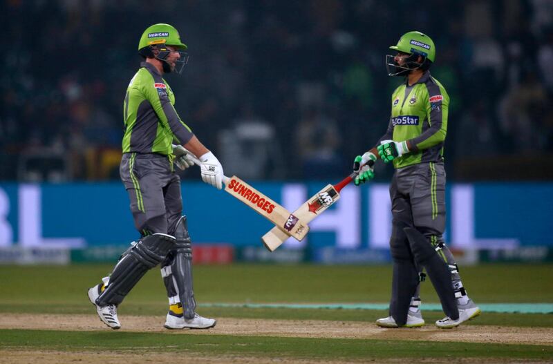 Lahore Qalandars batsmen Mohammad Hafeez, right, and Ben Dunk during the match against Quetta Gladiators. AP Photo