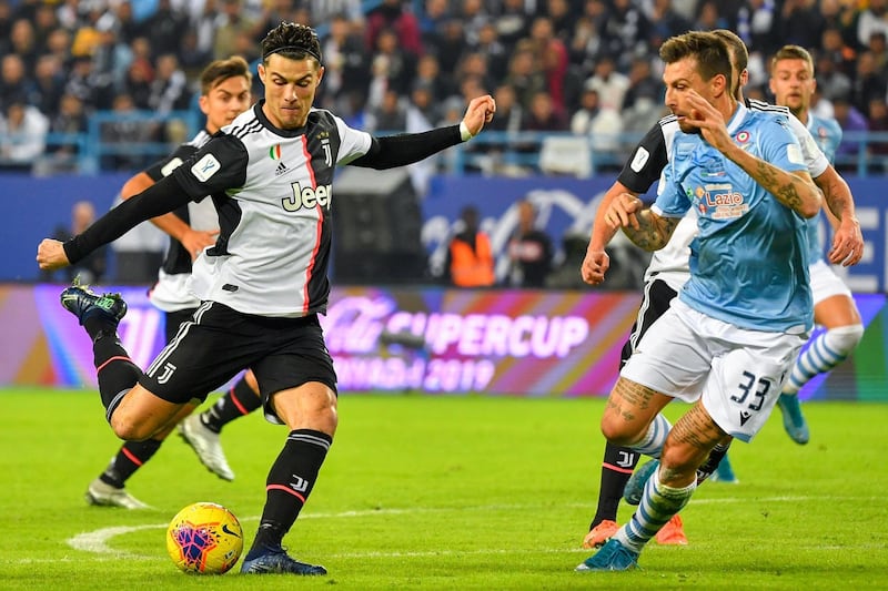 Juventus' Portuguese forward Cristiano Ronaldo (L) attempts a shot. AFP