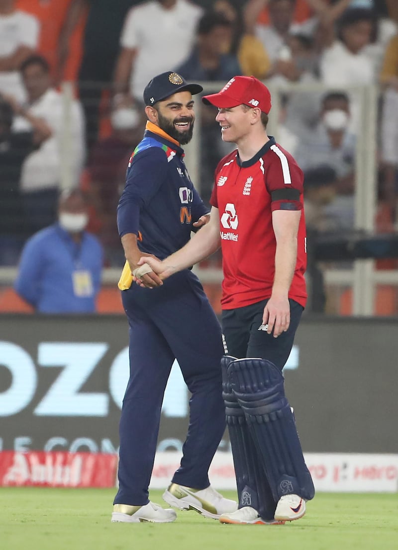 Virat Kohli of India and Eoin Morgan of England at the end of the game. Getty