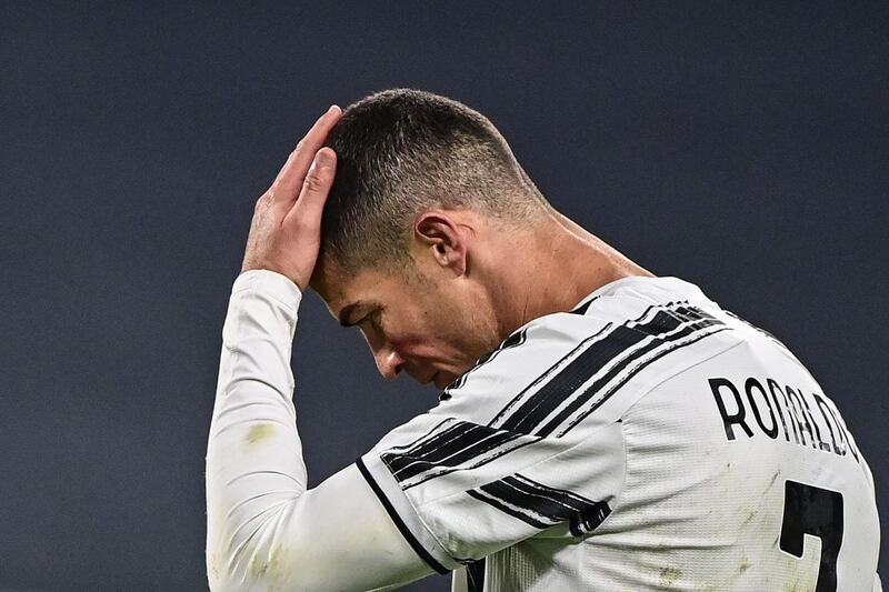 Cristiano Ronaldo reacts after missing a chance. AFP
