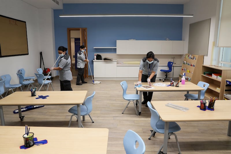 Staff cleaning the doors, classrooms, corridors at Brighton College Dubai before pupils returning on August 29.