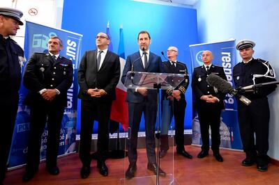 French Interior Minister Christophe Castaner (C), flanked by French Junior Interior Minister Laurent Nunez (3rdL), delivers a speech during a visit to the police headquarters in Toulon, southern France, on May 3, 2019. The French government on May 2, 2019 accused radicals of storming a famed Paris hospital during a violent May Day showdown, while protesters insisted they were only seeking refuge from a police crackdown. Interior Minister Christophe Castaner denounced the incident as an "attack" on an intensive care unit at the Pitie-Salpetriere hospital, in remarks likely to raise further tensions between the government and the "yellow vest" demonstrators. 
 / AFP / GERARD JULIEN
