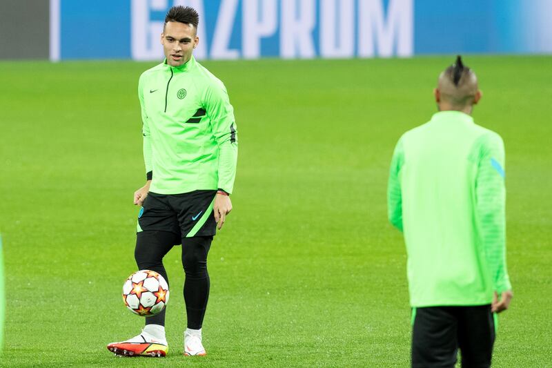 Inter Milan striker Lautaro Martinez and midfielder Arturo Vidal attend a training session of at Santiago Bernabeu in Madrid, Spain ahead of the Group D Uefa Champions League match against Real Madrid. EPA