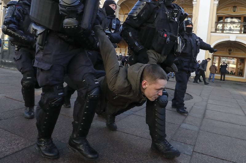 Russian policemen detain a participant in an unauthorised rally against the Russian special operation in Ukraine, in Saint Petersburg, Russia, on March 6. EPA