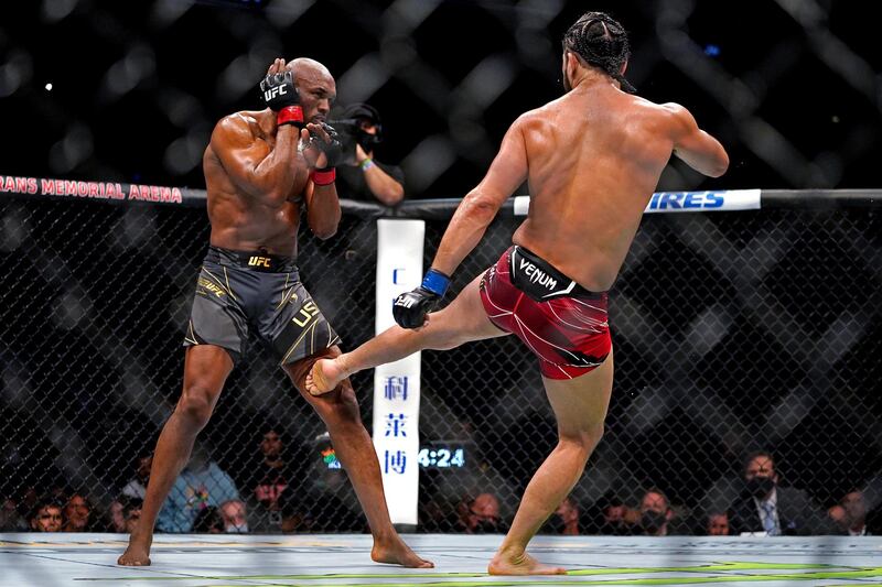 Kamaru Usman (red gloves) fights Jorge Masvidal during UFC 261 at VyStar Veterans Memorial Arena. USA Today