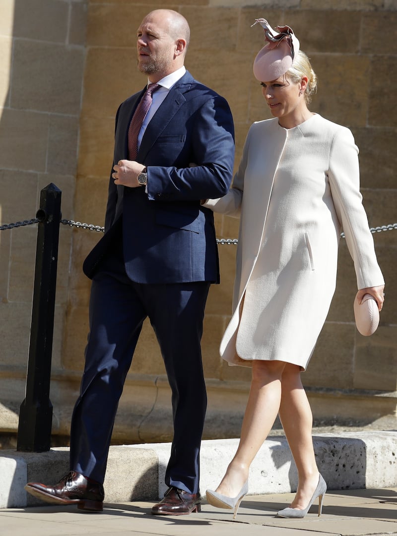 Mike Tindall and Zara Tindall, wearing a cream coat and blush hat, attend the Easter Sunday service at St George's Chapel on April 21, 2019 in Windsor, England. Getty Images