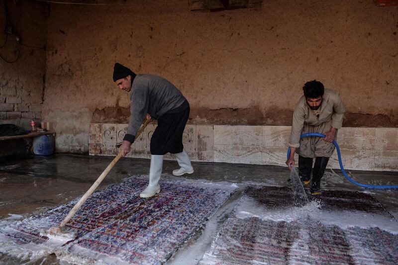 Rugs are washed at a factory in Herat, Afghanistan. AFP