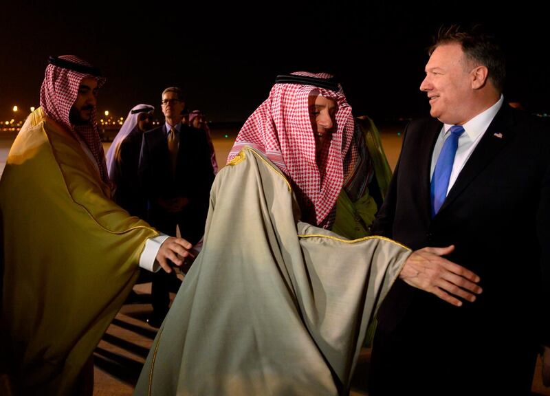 Pompeo is greeted by Al-Jubeir. AFP