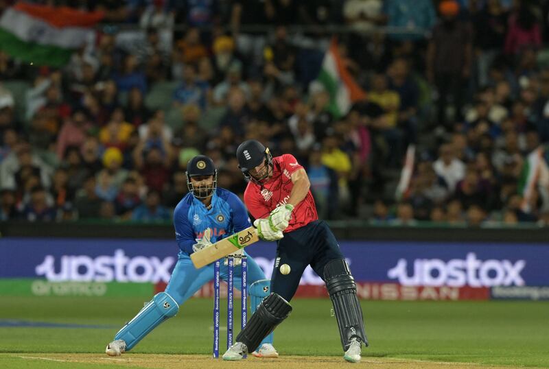 England's Jos Buttler plays a shot on his way to an unbeaten 80. AFP