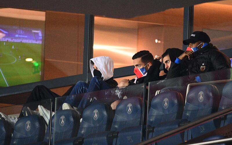 Paris Saint-Germain players Presnel Kimpembe, Marco Verratti and Pablo Sarabia look on. AFP