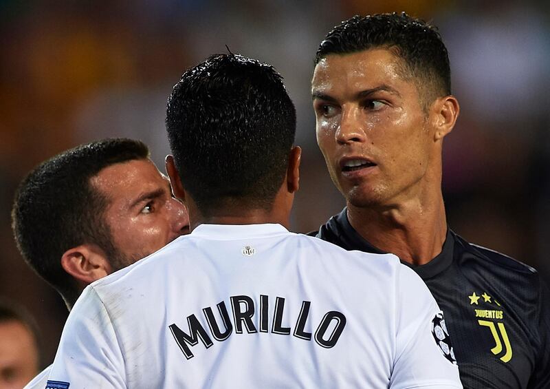 Jose Luis Gaya and Jeison Murillo of Valencia argue with Cristano Ronaldo. Getty Images