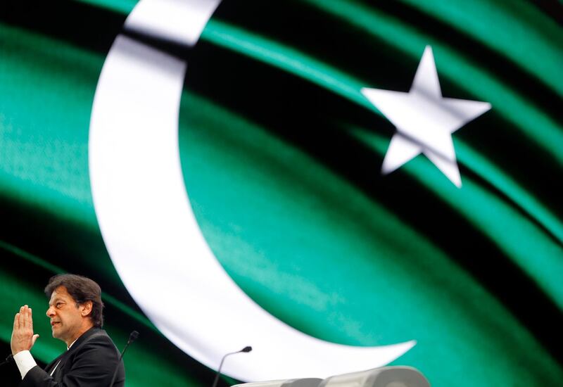 Pakistani Prime Minister Imran Khan, speaks in front of a screen displaying his national flag during the opening of the Future Investment Initiative conference, in Riyadh, Saudi Arabia. AP Photo