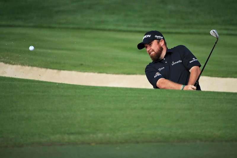 Shane Lowry of Ireland plays his third shot on the third hole. Getty Images