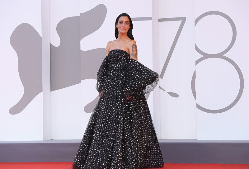 Italian singer Levante, in Armani Prive Couture, arrives at the premiere of the film 'Official Competition' during the 78th edition of the Venice Film Festival. EPA