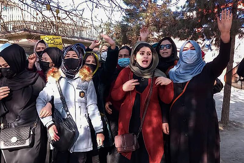 Afghan women protest against the ban on university education, in Kabul. AFP