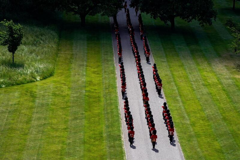 Guards leave Windsor Castle after the ceremony to mark the official birthday of Queen Elizabeth  II. Getty Images